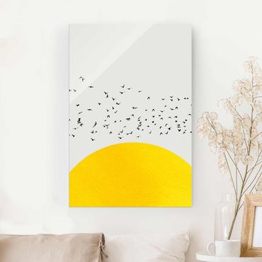 Glasschilderijen Flock Of Birds In Front Of Yellow Sun
