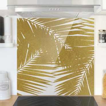 Spatscherm keuken View Through Golden Palm Leaves