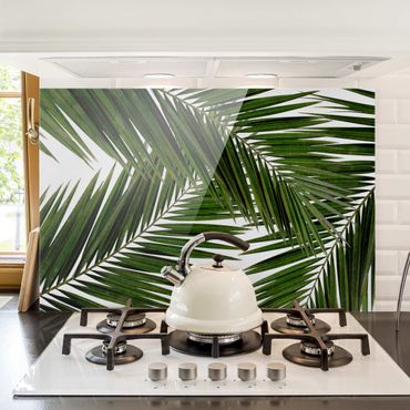 Spatscherm keuken View Through Green Palm Leaves