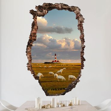 Muurstickers North Sea Lighthouse With Flock Of Sheep