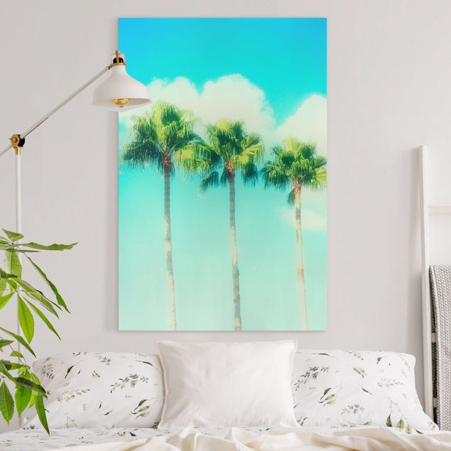 Canvas schilderijen Palm Trees Against Blue Sky
