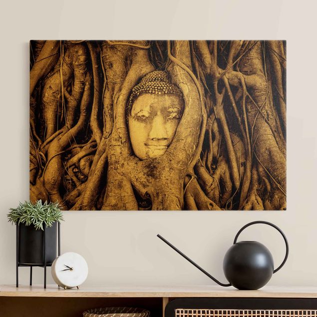 Canvas schilderijen Buddha In Ayutthaya Lined From Tree Roots In Brown