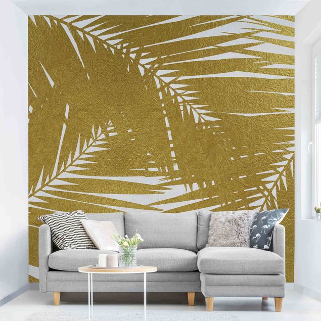Fotobehang View Through Golden Palm Leaves