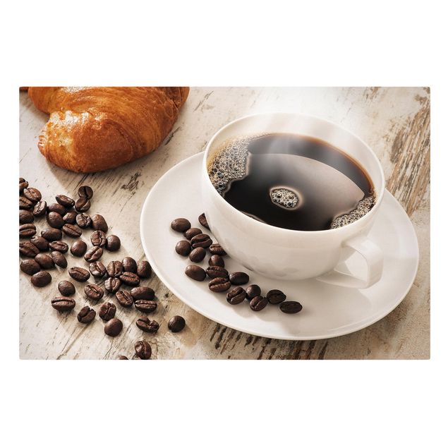Canvas schilderijen Steaming coffee cup with coffee beans