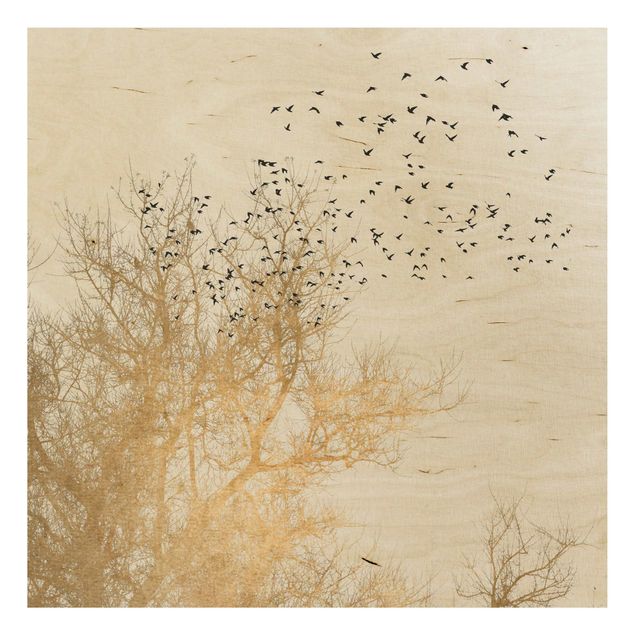Houten schilderijen Flock Of Birds In Front Of Golden Tree