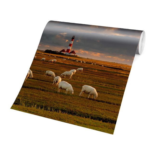 Fotobehang North Sea Lighthouse With Flock Of Sheep