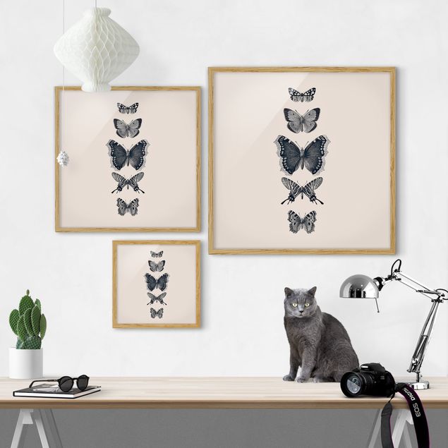 Ingelijste posters Ink Butterflies On Beige Backdrop