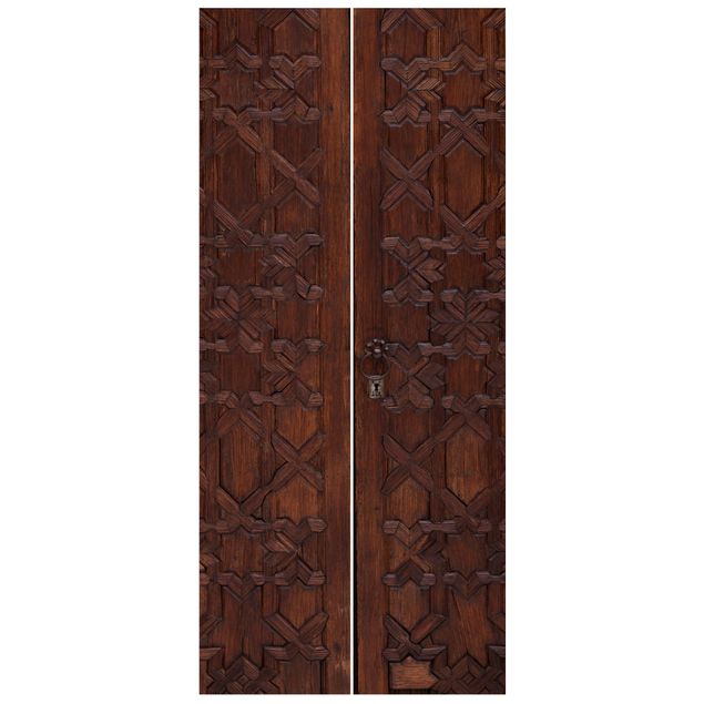 Deur behang Old Decorated Wooden Door In The Alhambra Palace
