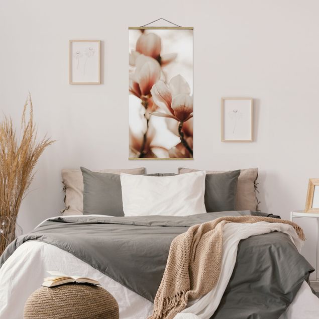 Stoffen schilderij met posterlijst Delicate Magnolia Flowers In An Interplay Of Light And Shadows